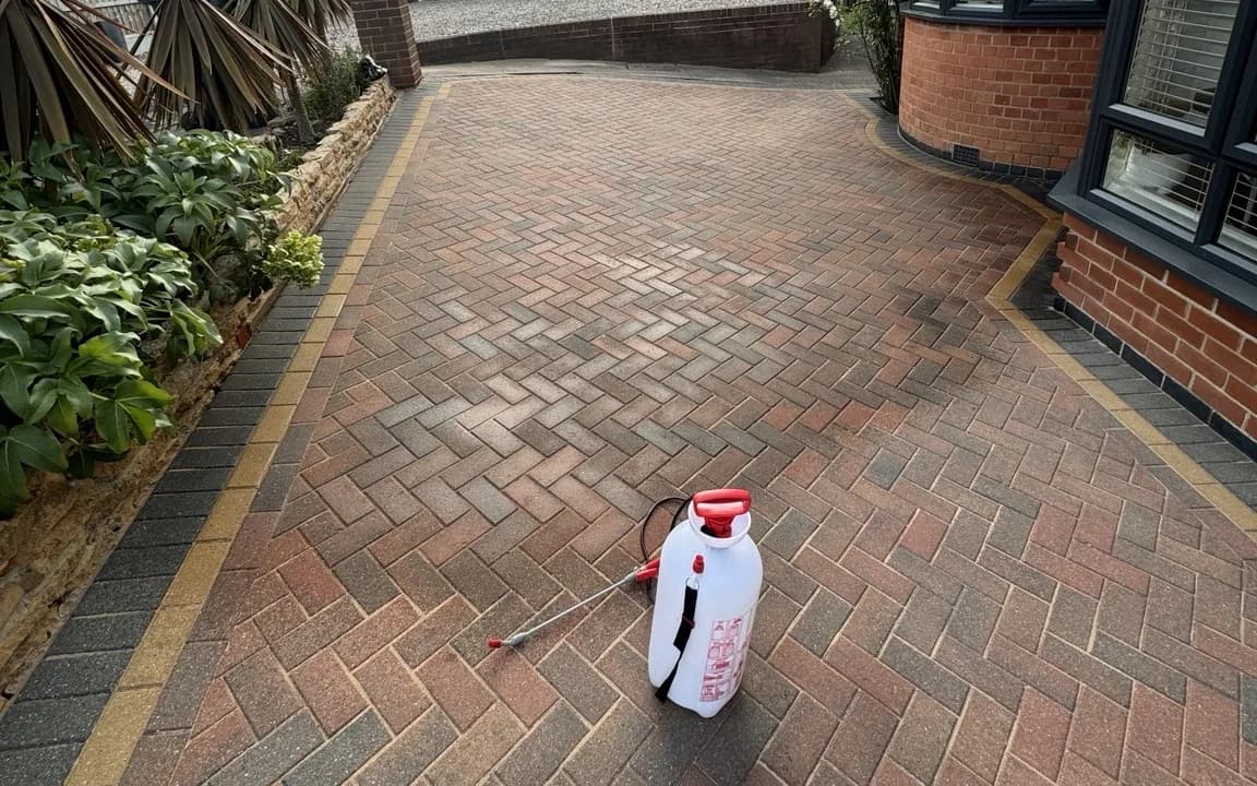 JetMagic sealing sprayer set out on a clean block paved driveway in Nottingham, ready to apply sealant